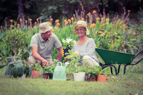 Landscaping team preparing tools and safety equipment at a work site